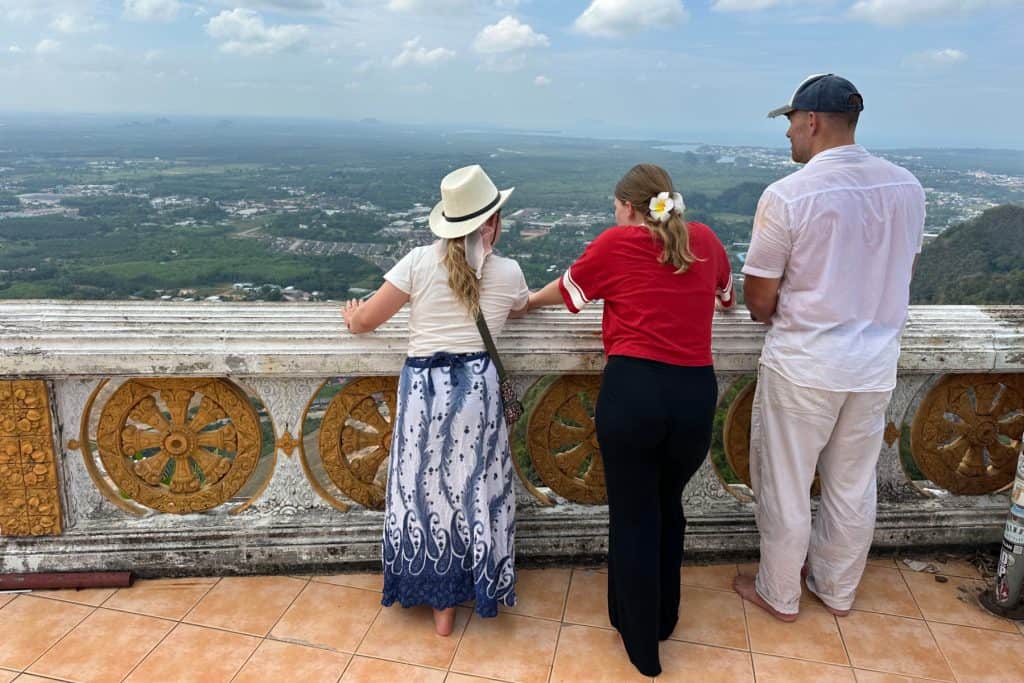 My family looking at the view of Krabi from the top of the climb to the Tiger Temple in Krabi