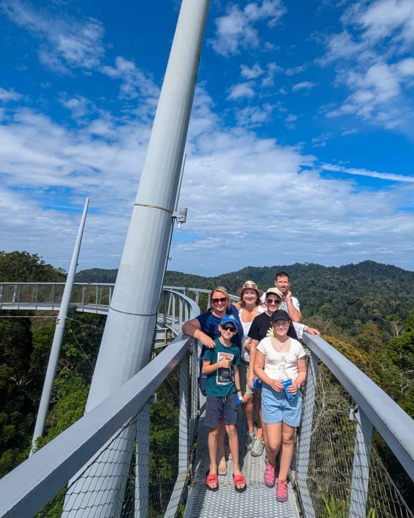 Our family with the Travelynn Family on the nest observation deck at the top of Penang Hill