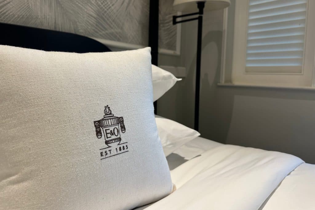 A natural coloured on a bed in our room at the Eastern & Oriental Hotel in Penang. It is printed with the E&O logo