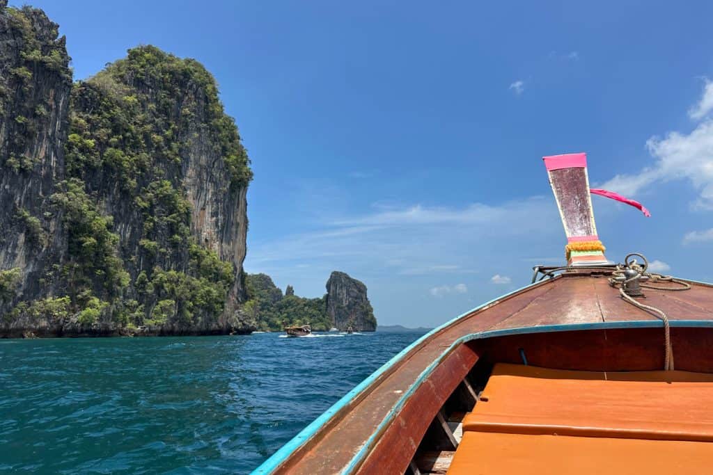 Bow of longtail boat heading towards Hong Island in Thailand's Andaman Sea