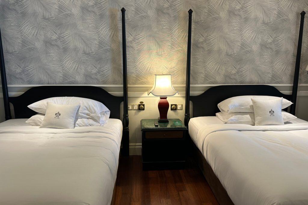 The small double beds in our suite