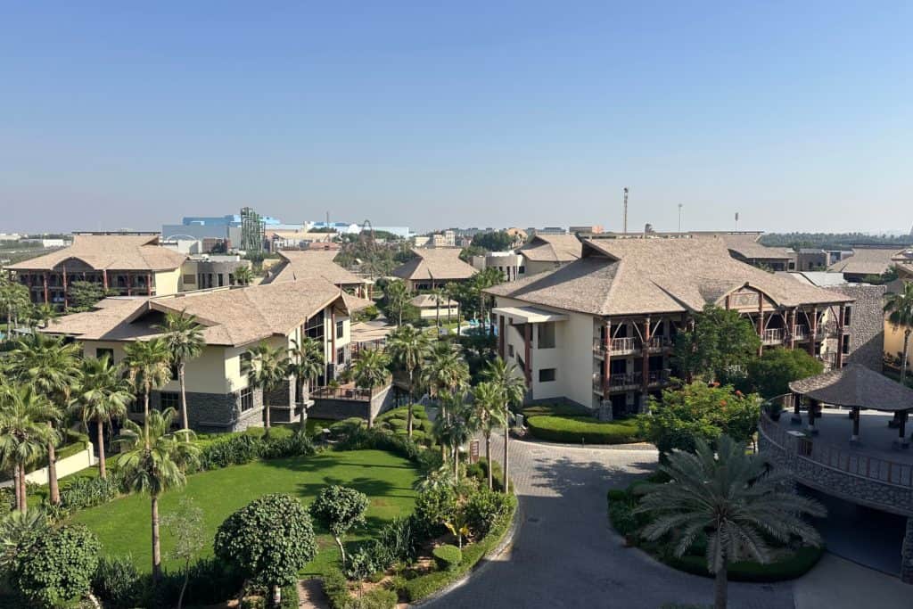 A view over the top of the Lapita Dubai Hotel resort. You can see the theme park rides just beyond the roofs