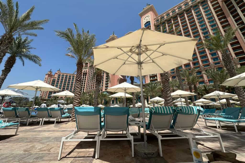 A row of sun loungers beside the pool at Atlantis The Palm