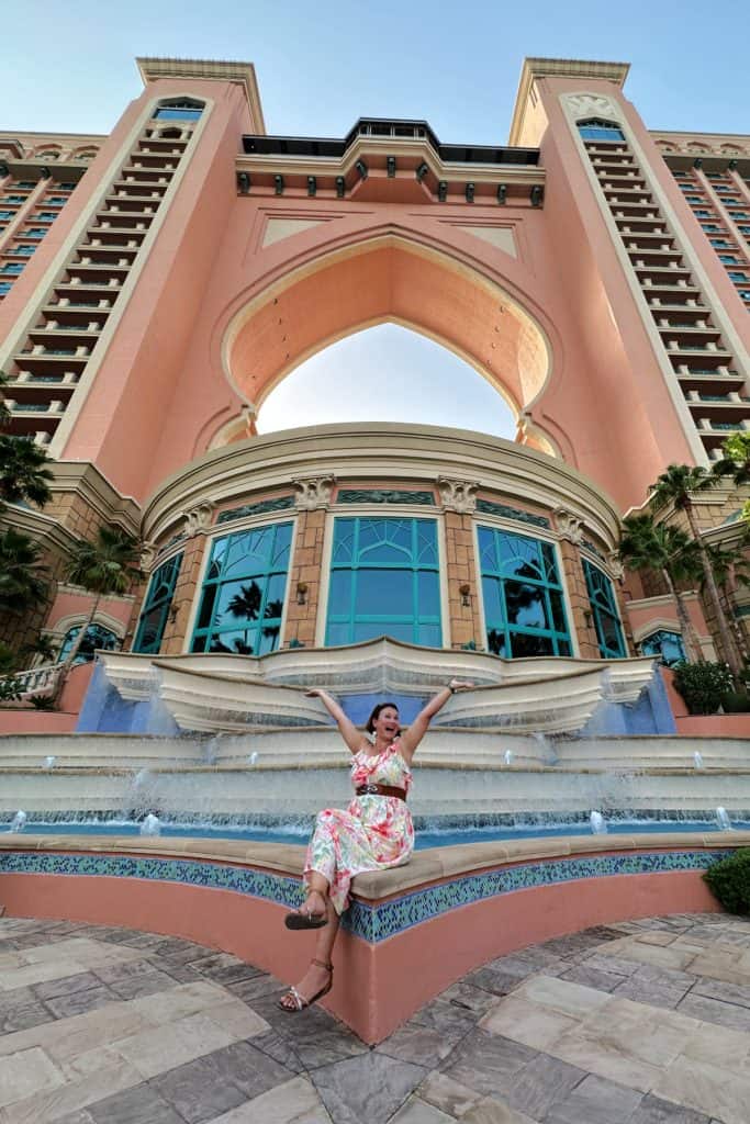 A picture of me posing below the arch of Atlantis The Palm Dubai