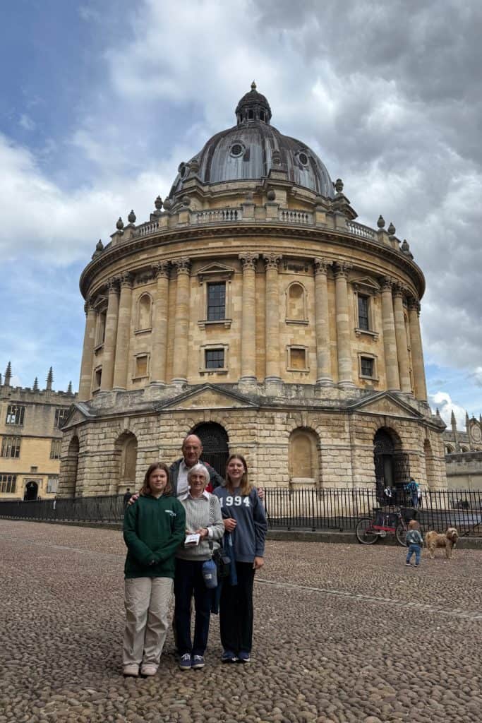 My children and parents stood in front of the Radcliffe Camera building in Oxford