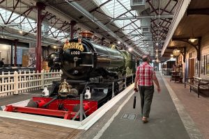 My dad walking past The Bristolian steam train in one of the old railway sheds at STEAM Museum in Swindon