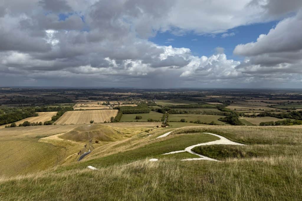 A view across the Bronze Age chalk horse outline on White Horse Hill overlooking the West Oxfordshire, Wiltshire and Buckinghamshire countryside