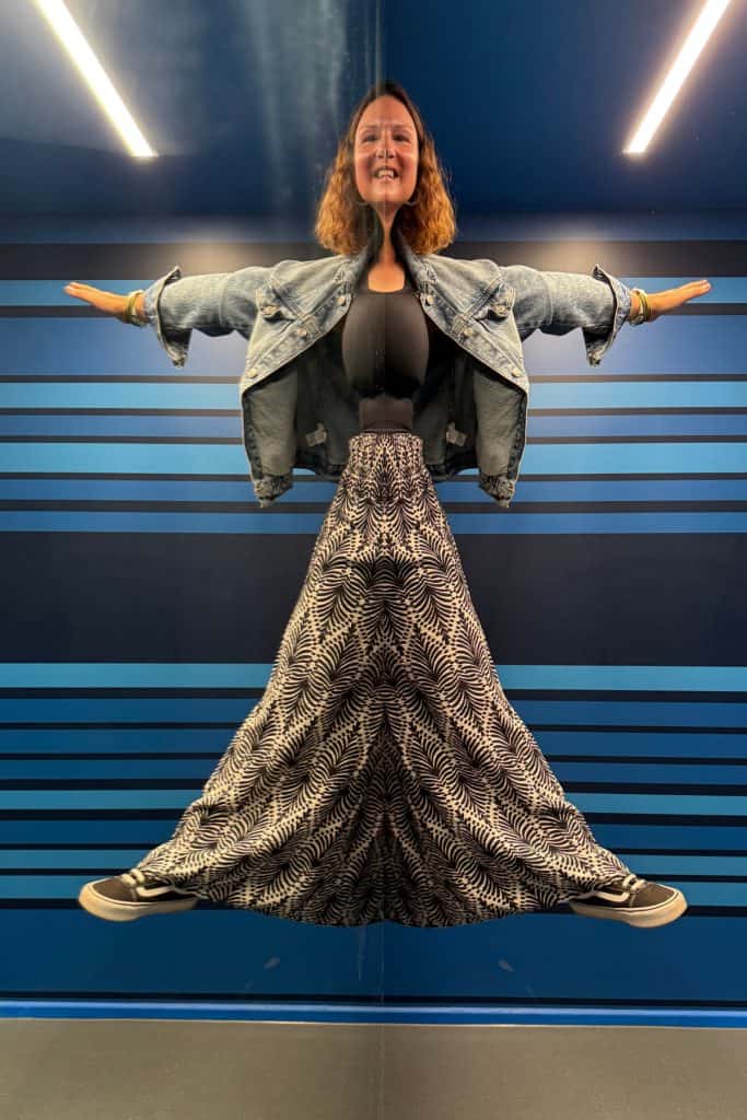 Me in a mirror illusion that makes it look like I'm jumping in the air