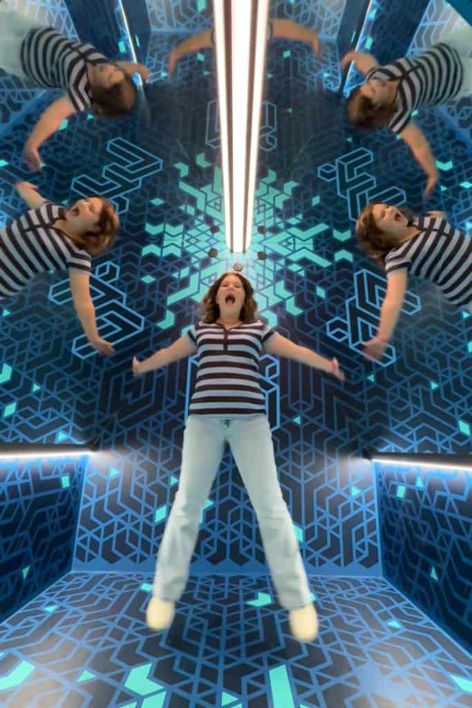My 11-year-old jumping in a mirror illusion box